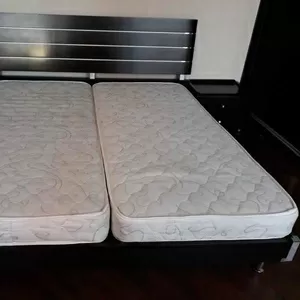 Продам двуспальную кровать + матрасы 